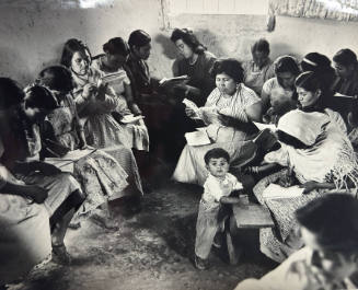 Elementary education is free and compulsory for children in all Latin American countries yet some 12 million children are still without schools and throughout the continent there are 60 million illiterate adults (40% of the adult population). In their drive to wipe out illiteracy, governments have been helped since 1956 by UNESCO's Major Project for the Extension of Primary Education in Latin America. Village women in Mexico, where UNESCO helped to set up a regional Fundamental Education Centre for Latin America, learn to read and write in an improvised classroom