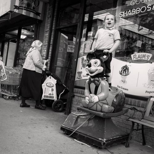 Castellana,William,Boy Holding MickeyLee Avenue-Williamsburg, Brooklyn, 2014.155