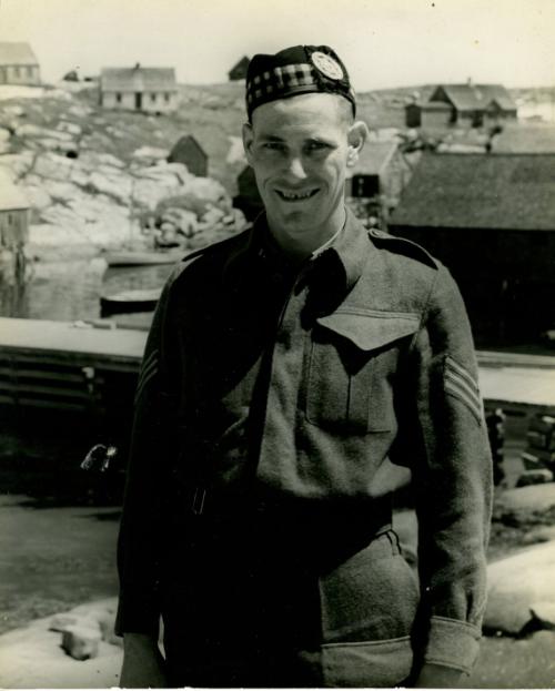 Like England and like the United States, Nova Scotia is a melting pot of races. Here a Scotch soldier on leave visits Peggy’s Cove. Canada still resists conscription for overseas, its expeditionary force is volunteer. In Nova Scotia are English, French, German, Scotch, Welsh, Irish, Mic Mac Indians and the descendants of British slaves