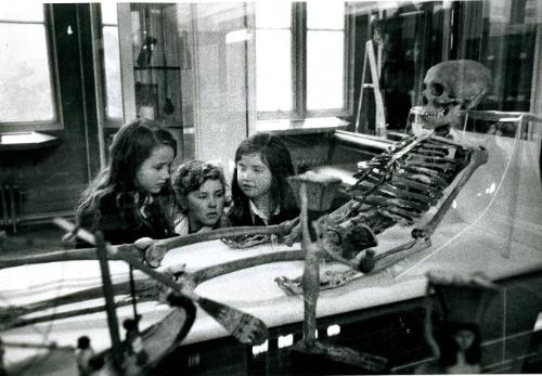 The Manchester Science Museum is an interesting place to hide when in fact one should be in school, these children playing truant from their morning class, England