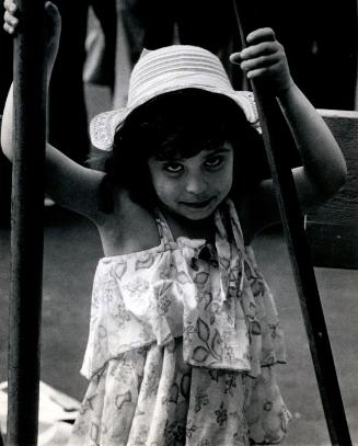 Girl wearing hat and dress, Puerto Rican Day, New York City